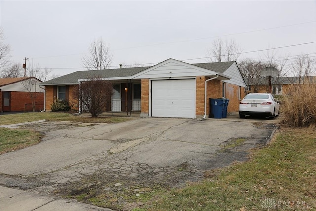 single story home featuring a garage