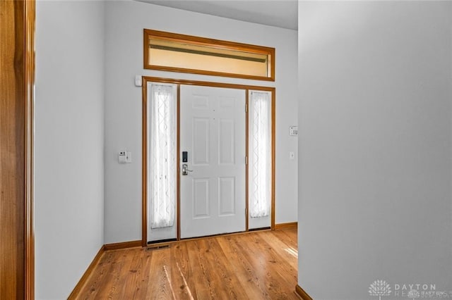 entryway with light wood-type flooring