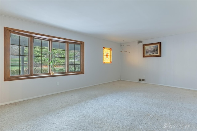 unfurnished room with carpet