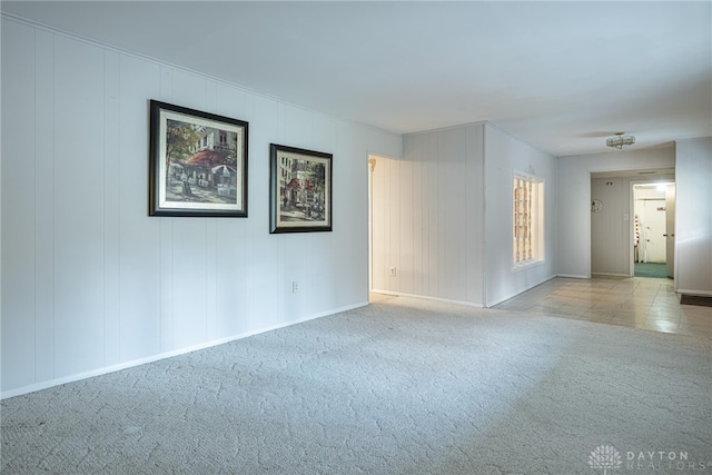 empty room featuring light carpet