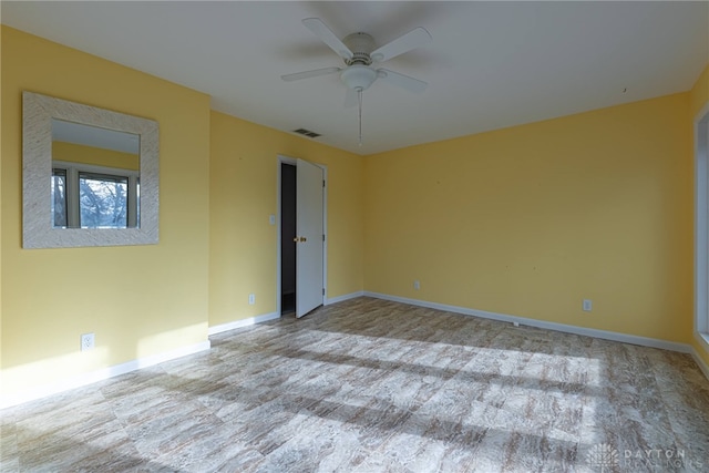 empty room with ceiling fan