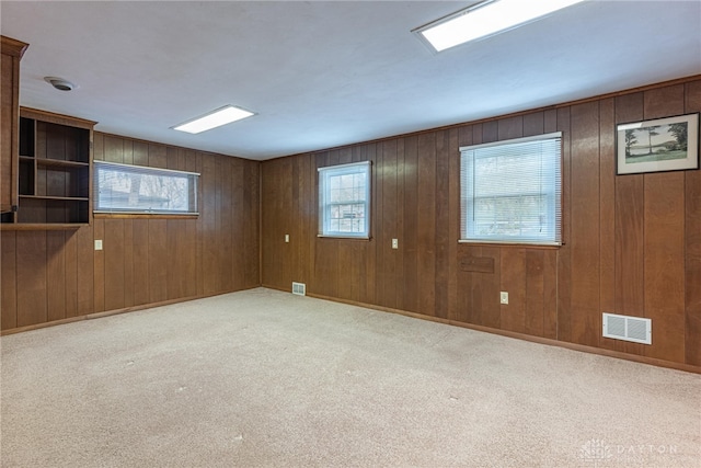 empty room with light colored carpet