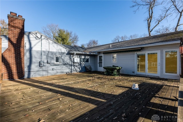 back of property featuring a deck