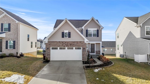 view of front of home with a garage and a front yard