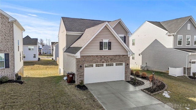 view of home's exterior with a garage and a yard