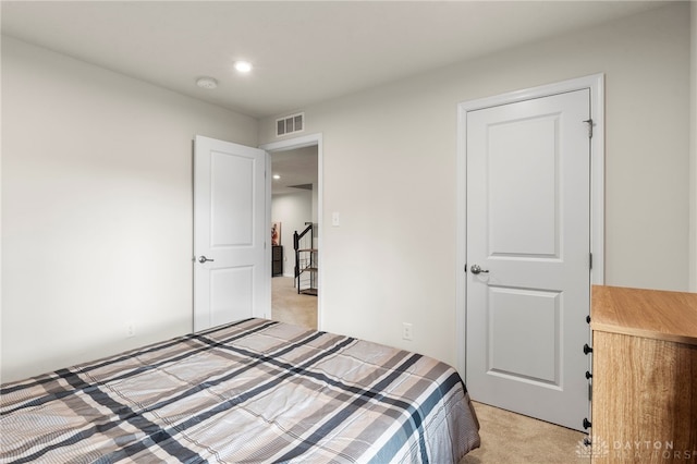 bedroom with light carpet