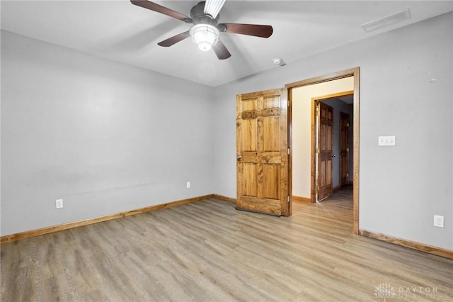 unfurnished bedroom featuring light hardwood / wood-style floors and ceiling fan