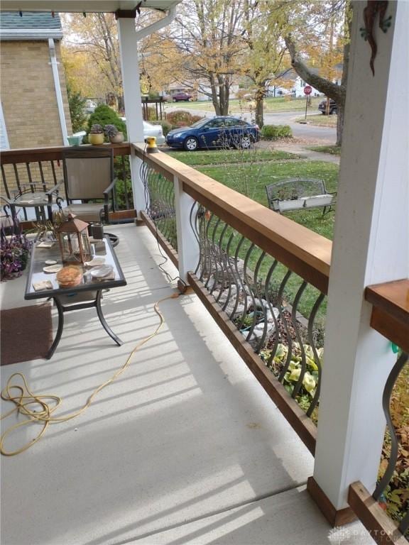 balcony featuring a porch