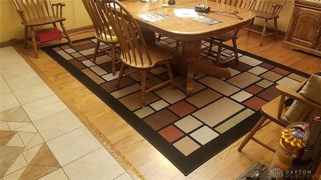 dining room with light hardwood / wood-style floors