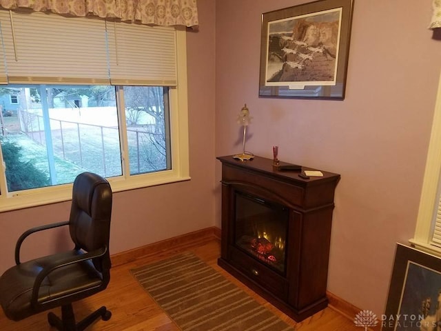 office space with hardwood / wood-style floors