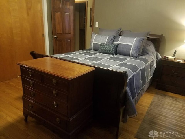 bedroom featuring light wood-type flooring