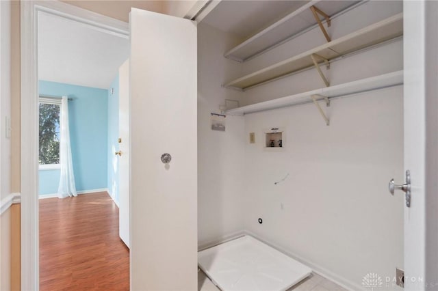 laundry room featuring hookup for a washing machine and wood-type flooring