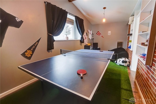 playroom with wood-type flooring