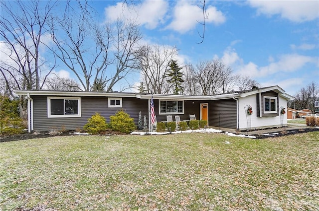 ranch-style home with a front yard