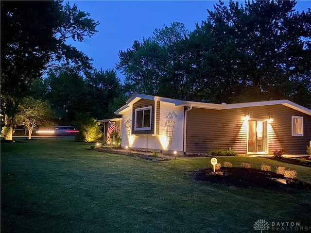 view of front of property with a front lawn