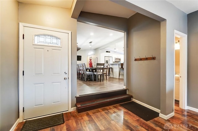 foyer entrance featuring dark hardwood / wood-style flooring