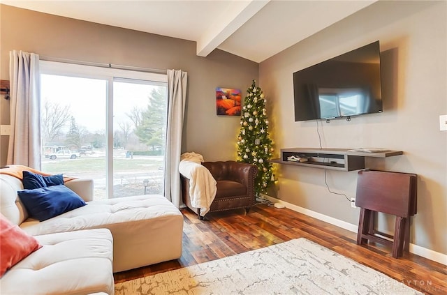 living room featuring vaulted ceiling with beams and dark wood-type flooring