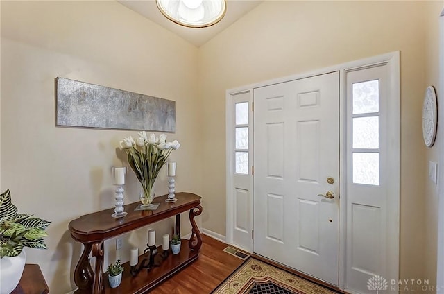 entrance foyer featuring dark wood-type flooring