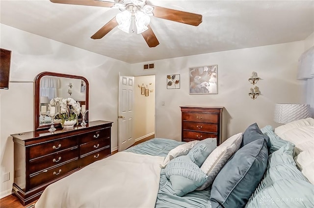 bedroom featuring ceiling fan