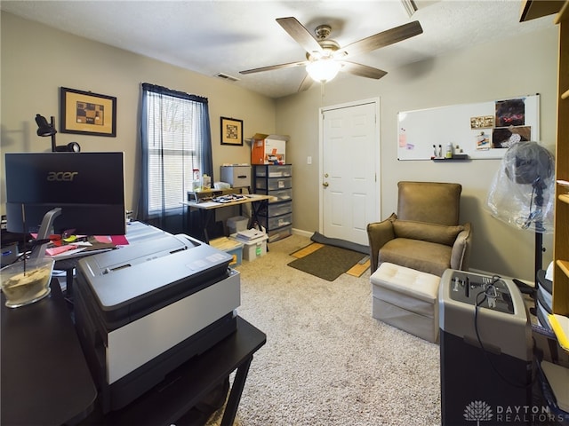 office space with ceiling fan and carpet flooring