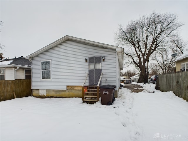 view of snow covered house