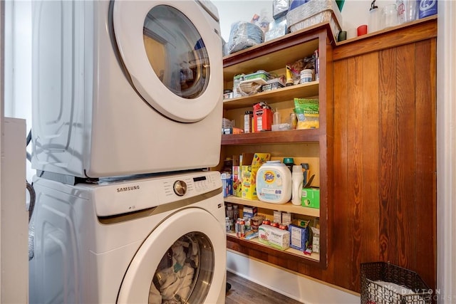 laundry room featuring stacked washer / dryer