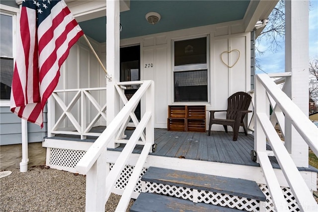 property entrance with covered porch