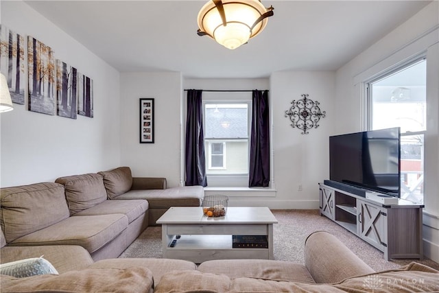 living room featuring light colored carpet