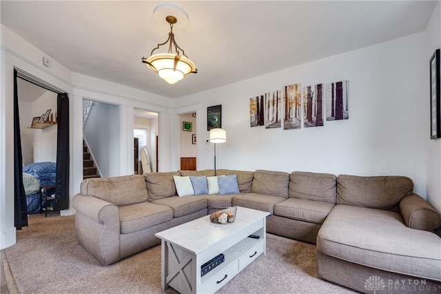 living room featuring light colored carpet