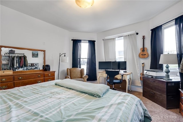 bedroom featuring carpet