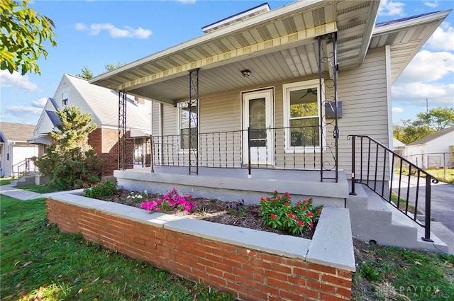 doorway to property with covered porch