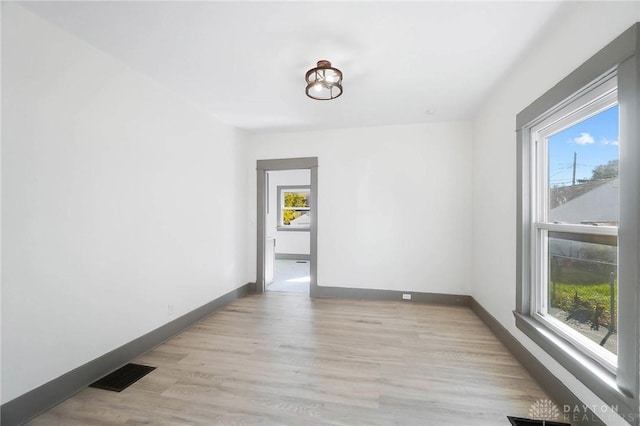 empty room featuring light wood-type flooring