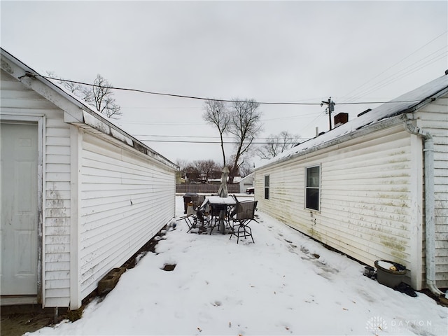 view of yard covered in snow