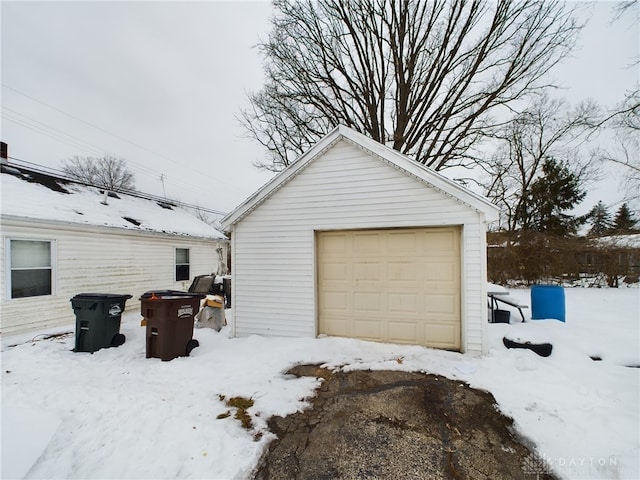 view of snow covered garage