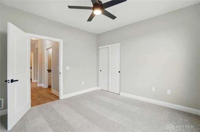 1507 Kingsgate, Springfield, OH 45502 - unfurnished bedroom featuring carpet flooring, baseboards, ceiling fan, and a closet