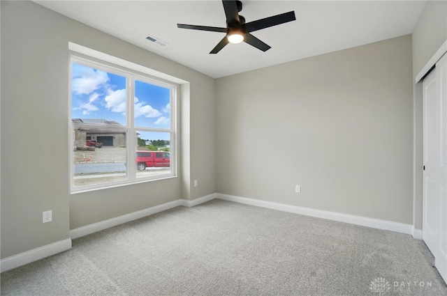 1507 Kingsgate, Springfield, OH 45502 - unfurnished bedroom featuring carpet, baseboards, a closet, and ceiling fan