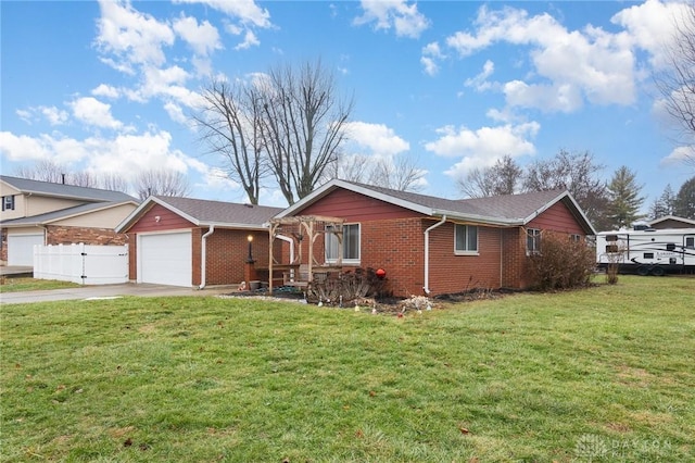 ranch-style home with a garage and a front lawn