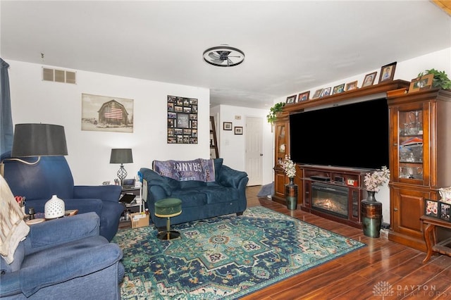 living room with dark wood-type flooring