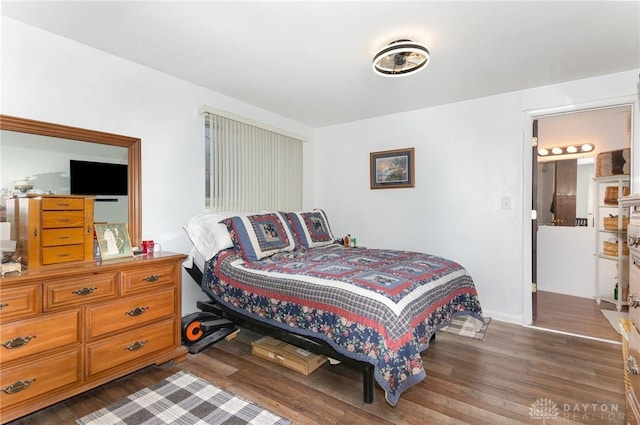 bedroom featuring dark wood-type flooring