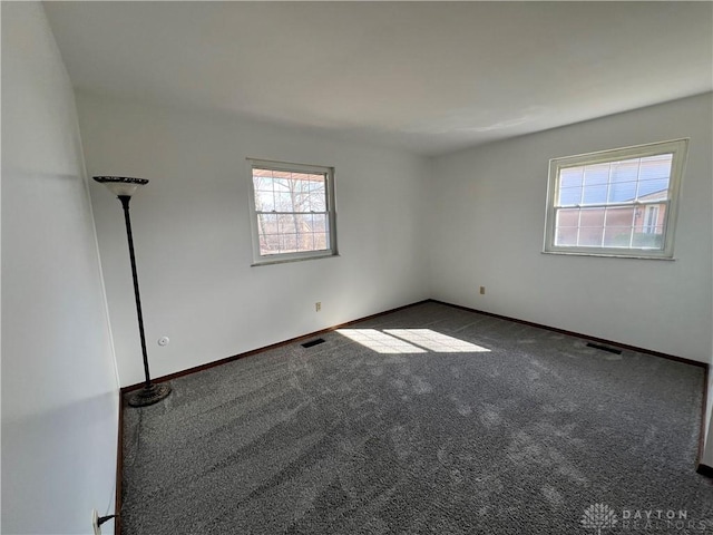 view of carpeted spare room