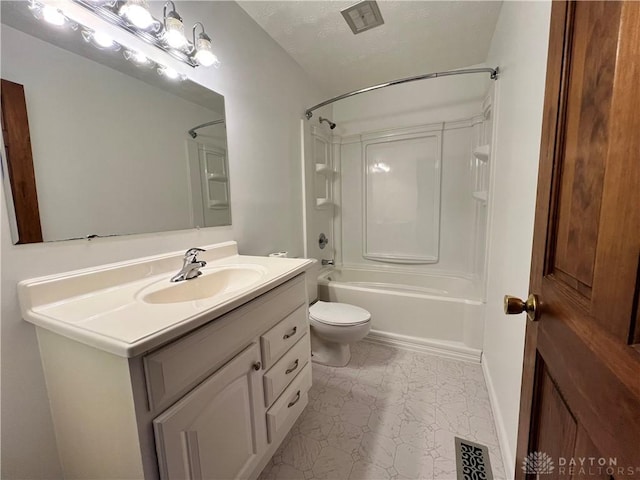 full bathroom featuring washtub / shower combination, vanity, and toilet