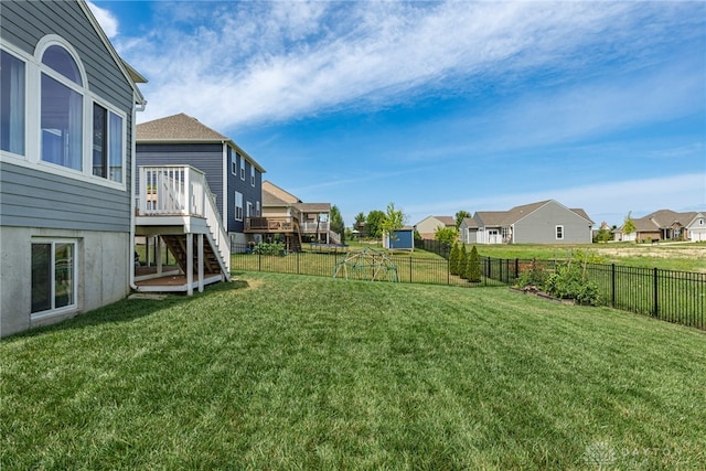 view of yard featuring a wooden deck