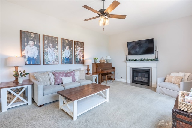 living room with light carpet and ceiling fan