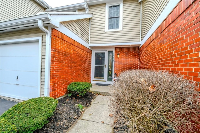 property entrance featuring a garage