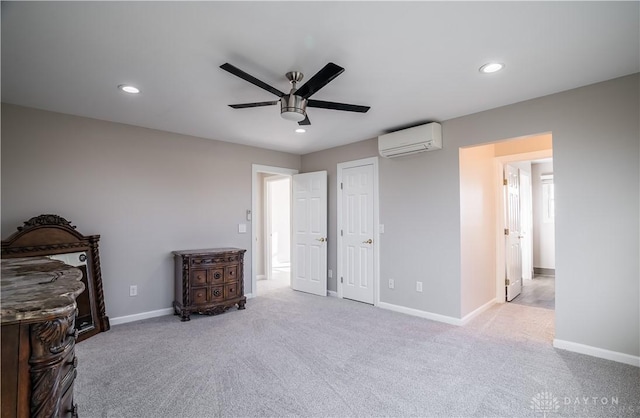 bedroom featuring a wall mounted air conditioner, light colored carpet, and ceiling fan