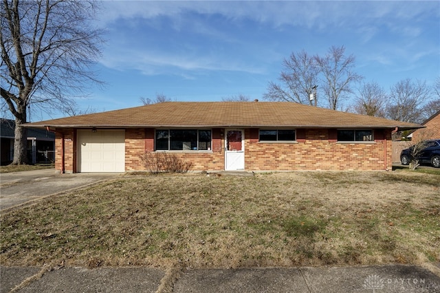 single story home featuring a garage and a front lawn