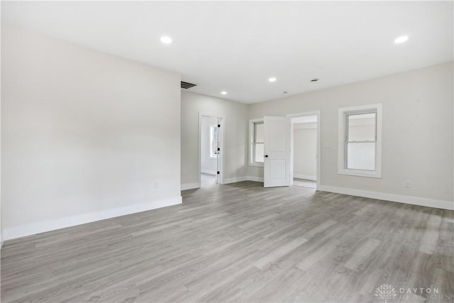 empty room featuring light hardwood / wood-style flooring