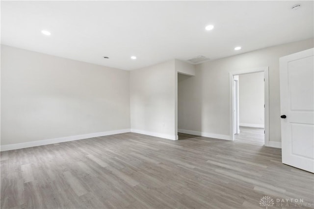 unfurnished room featuring light wood-type flooring