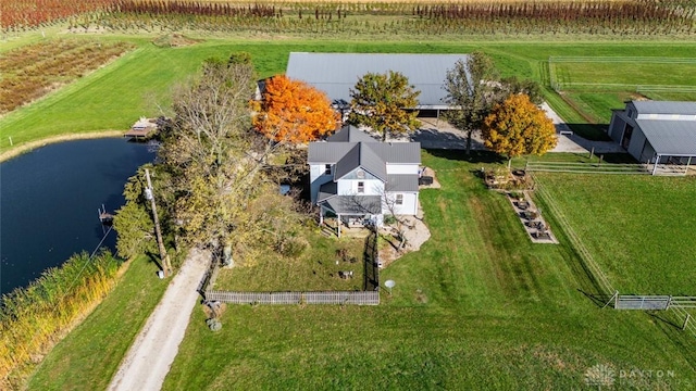 aerial view featuring a rural view and a water view