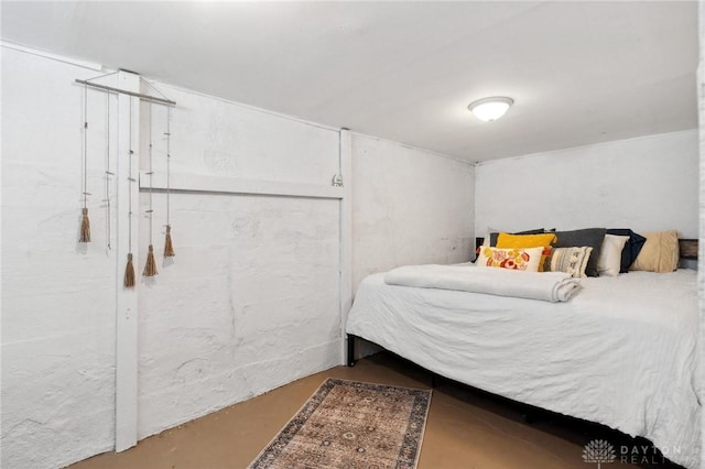 bedroom with concrete flooring